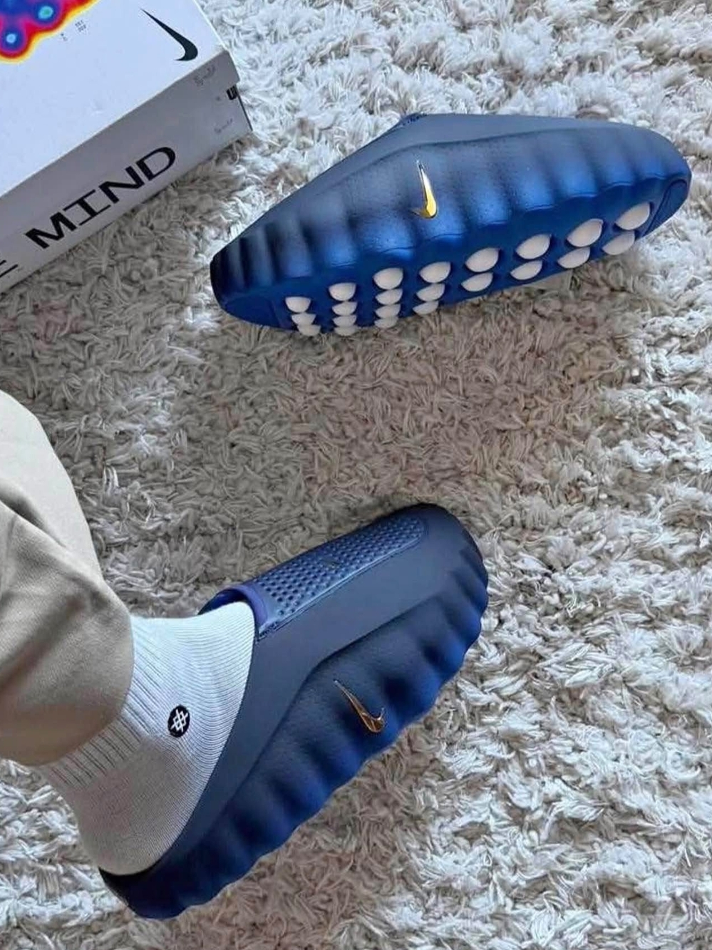 Nike Men’s Navy Foam Slip-On Slides with Gold Swoosh